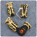 CJ gold leopard print dog shoes; package quantity unverified
